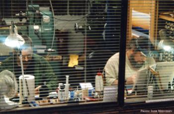 Alexander and James working in the shop